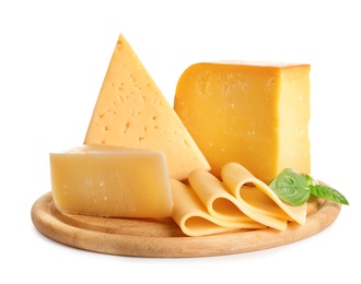 Photo of Wooden board with different kinds of cheese and basil on white background