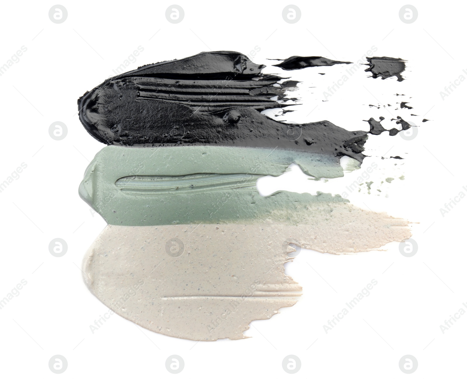 Photo of Different professional face mask smears on white background
