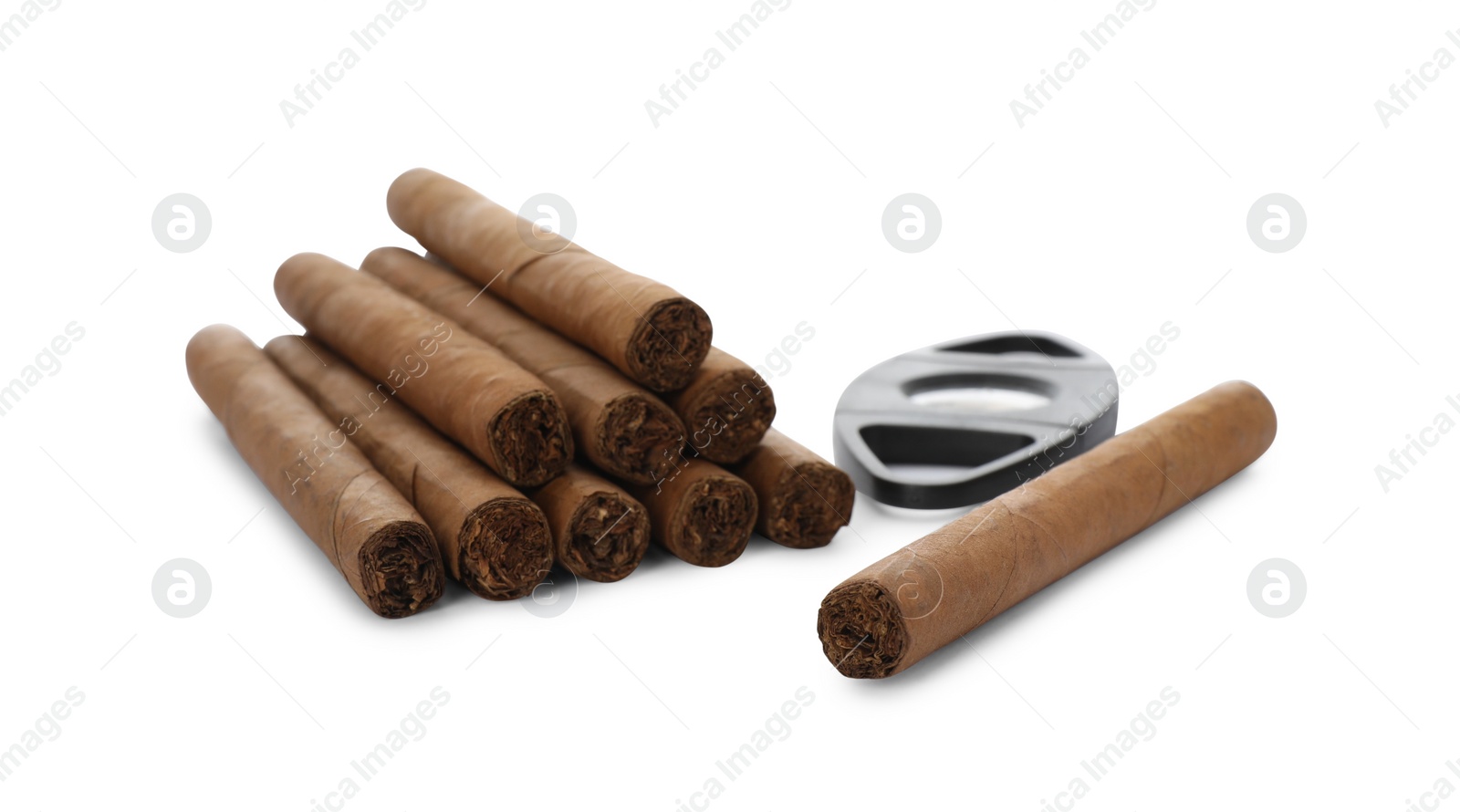 Photo of Cigars and guillotine cutter on white background