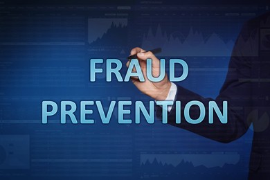 Image of Fraud prevention. Man writing words on glass board, closeup. Data and graphs on blue background