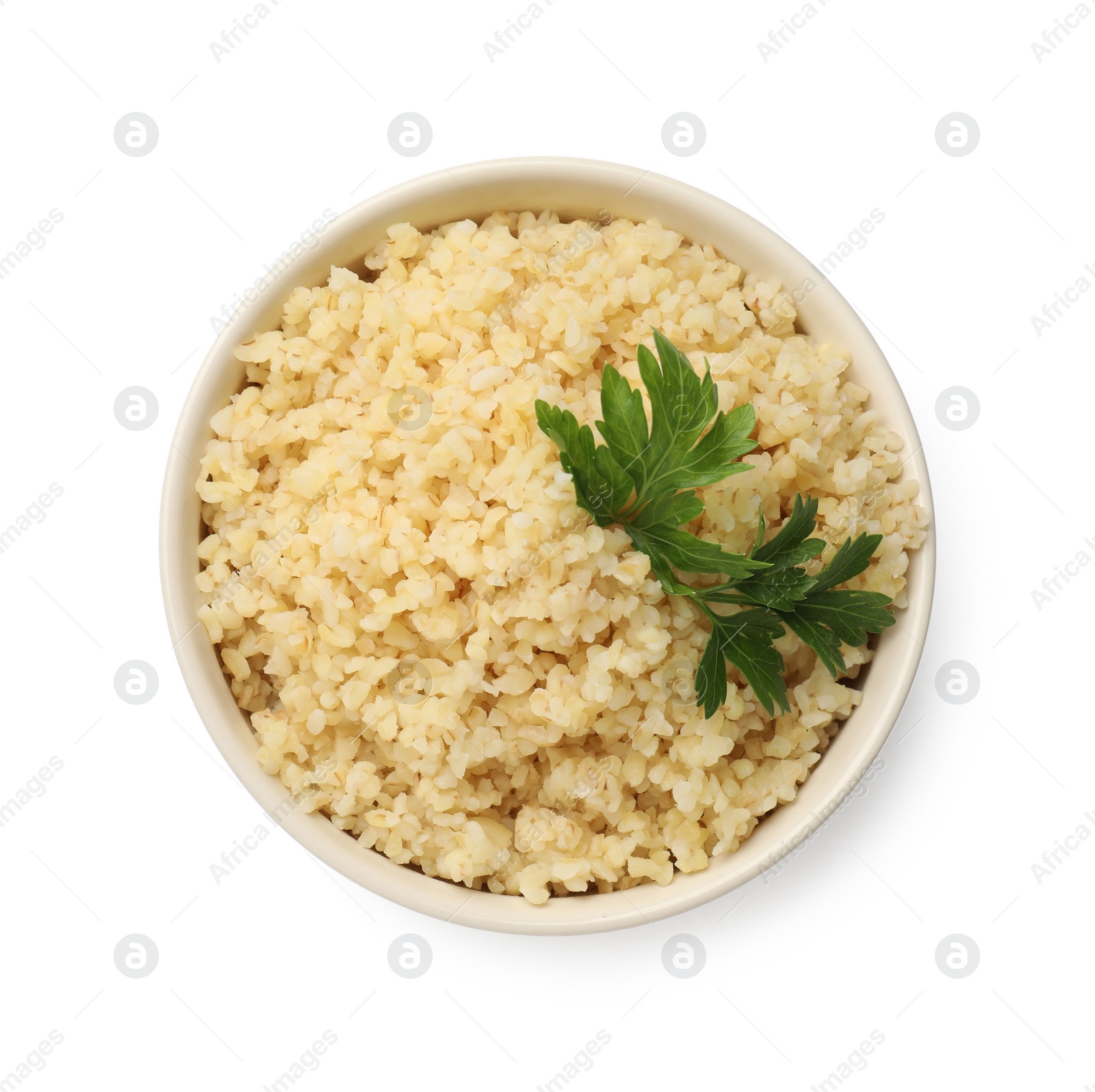 Photo of Delicious bulgur with parsley in bowl isolated on white, top view