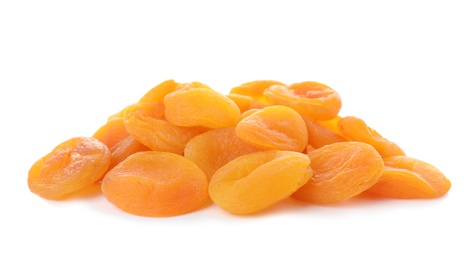 Photo of Tasty apricots on white background. Dried fruit as healthy food