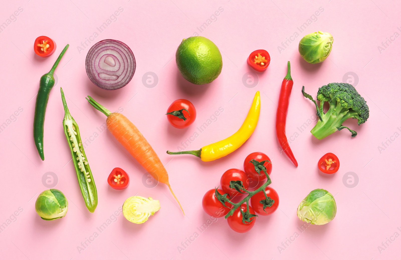 Photo of Flat lay composition with fresh vegetables and fruit on color background