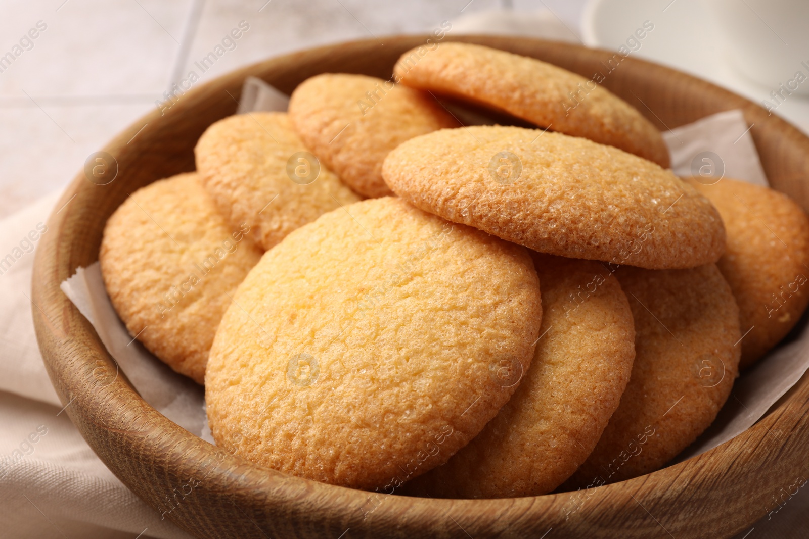 Photo of Delicious Danish butter cookies in bowl, closeup