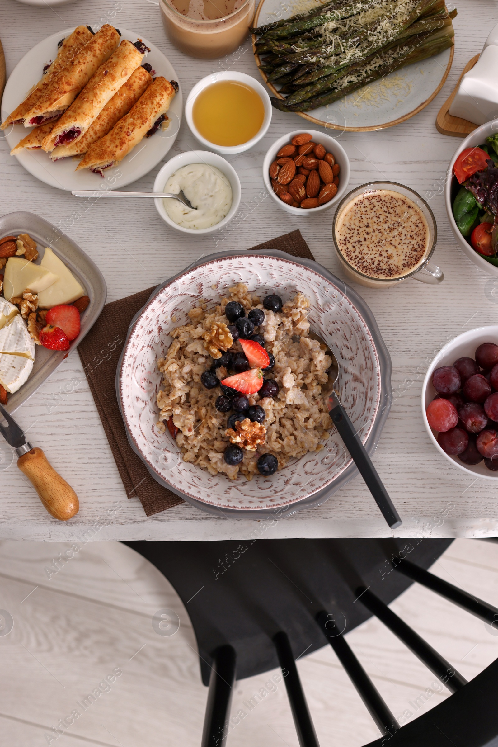 Photo of Many different dishes served on buffet table for brunch, flat lay