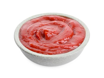 Photo of Tasty ketchup in bowl isolated on white. Tomato sauce