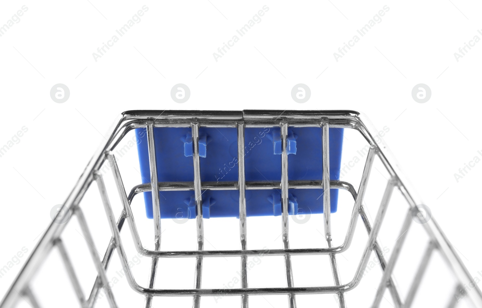 Photo of Empty shopping trolley isolated on white, closeup