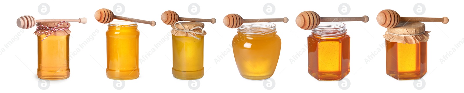 Image of Natural honey in glass jars and dippers isolated on white, set