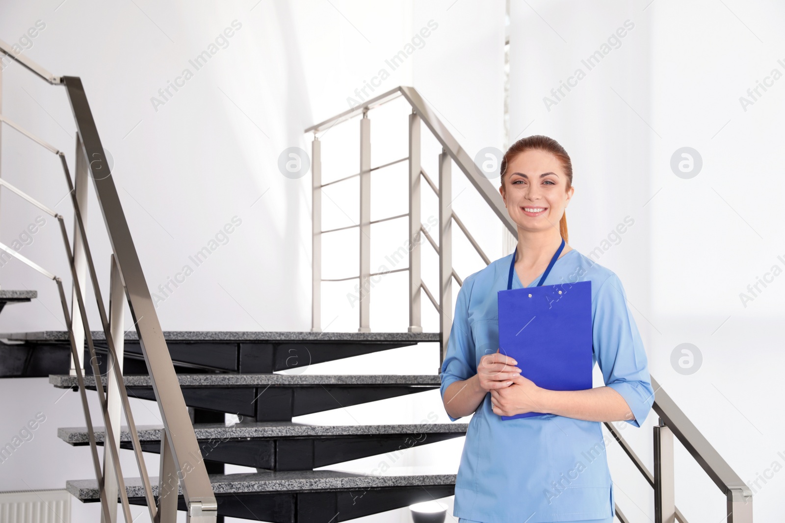 Photo of Portrait of young nurse in hospital. Medical assistant