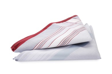 Photo of Folded handkerchiefs on white background. Stylish accessory