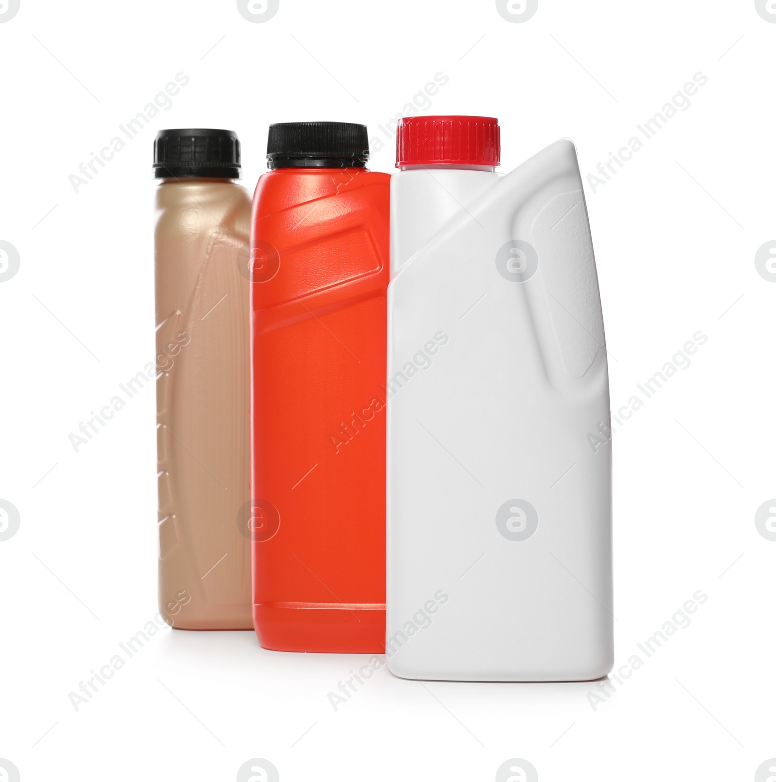Photo of Antifreeze in plastic bottles isolated on white
