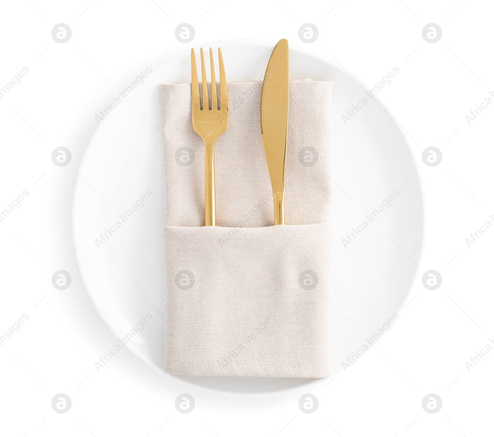 Photo of Stylish elegant cutlery with napkin in plate isolated on white, top view