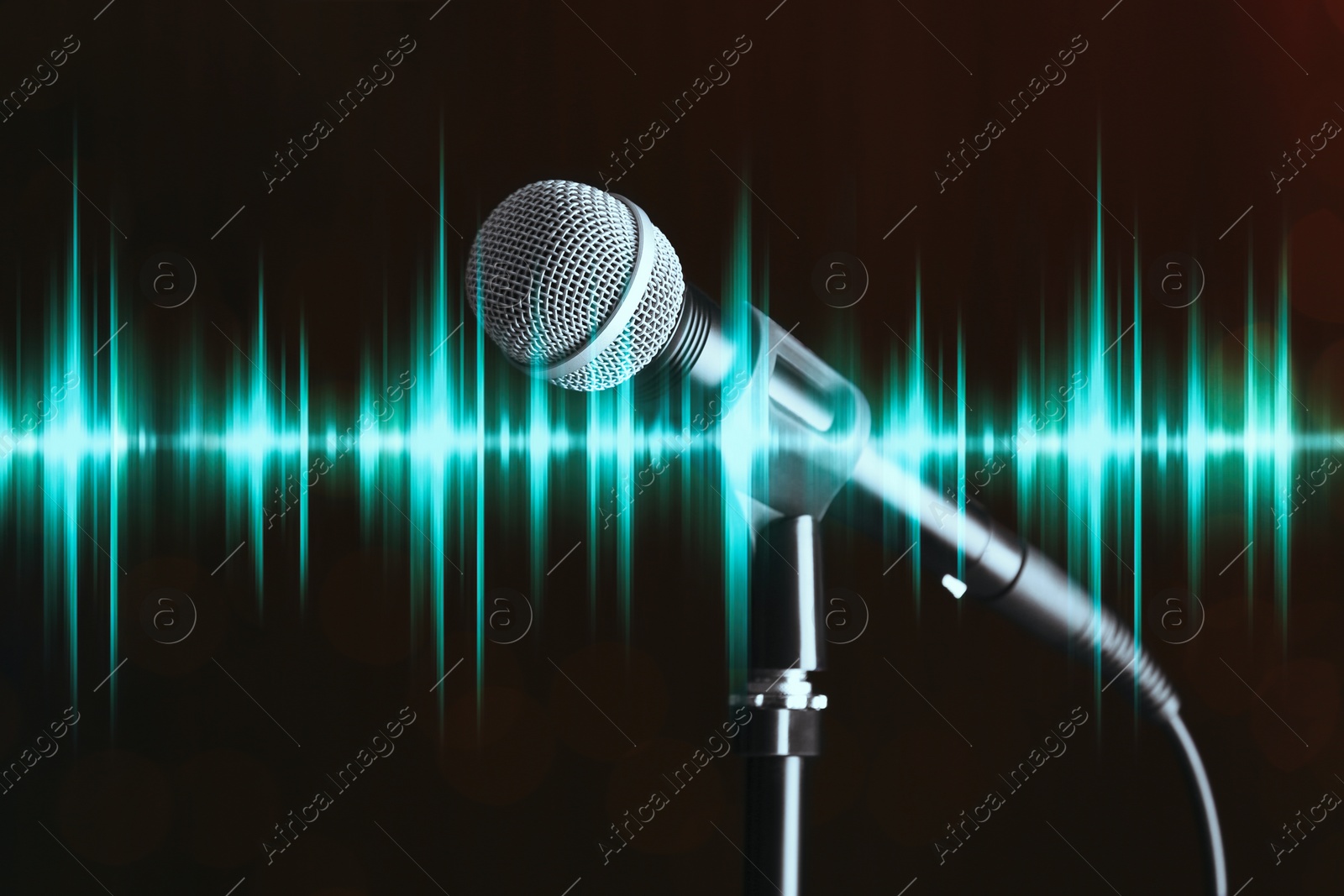 Image of Microphone and radio wave on dark background