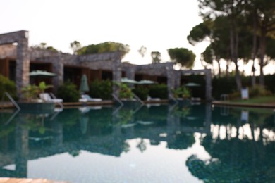 Photo of Outdoor swimming pool at resort, blurred view