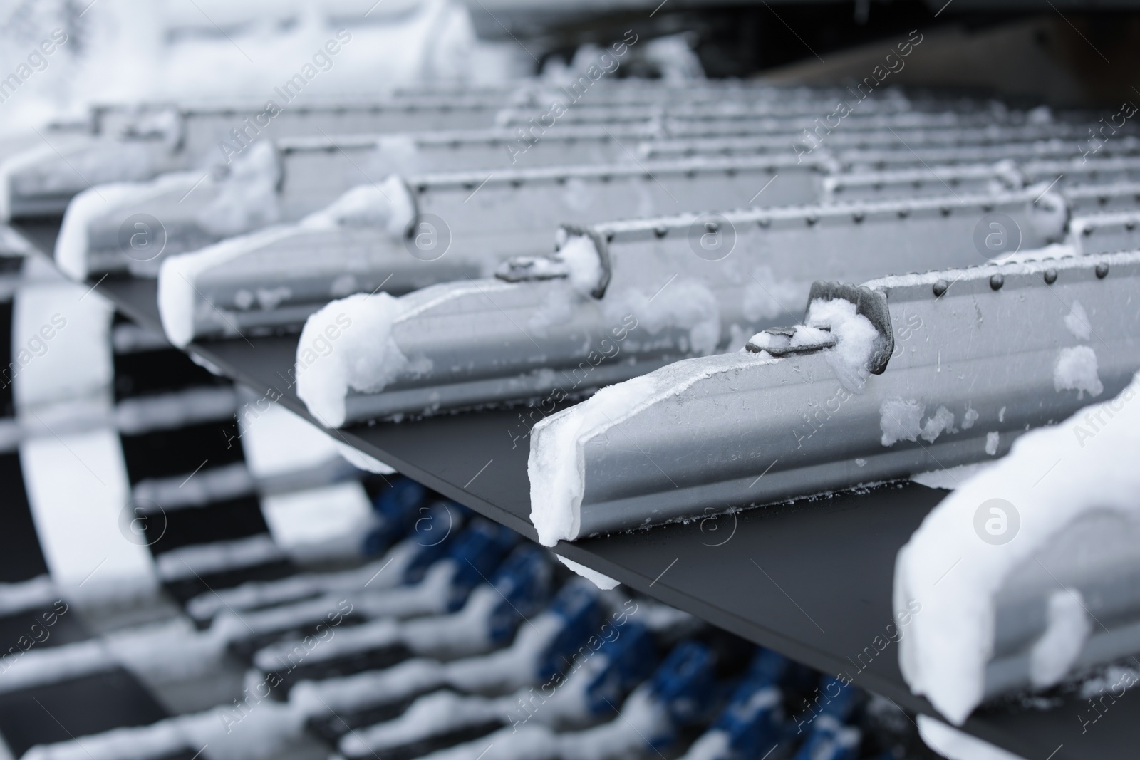 Photo of Closeup view of snow removal machine track