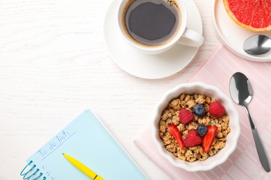 Tasty breakfast on white wooden table, flat lay