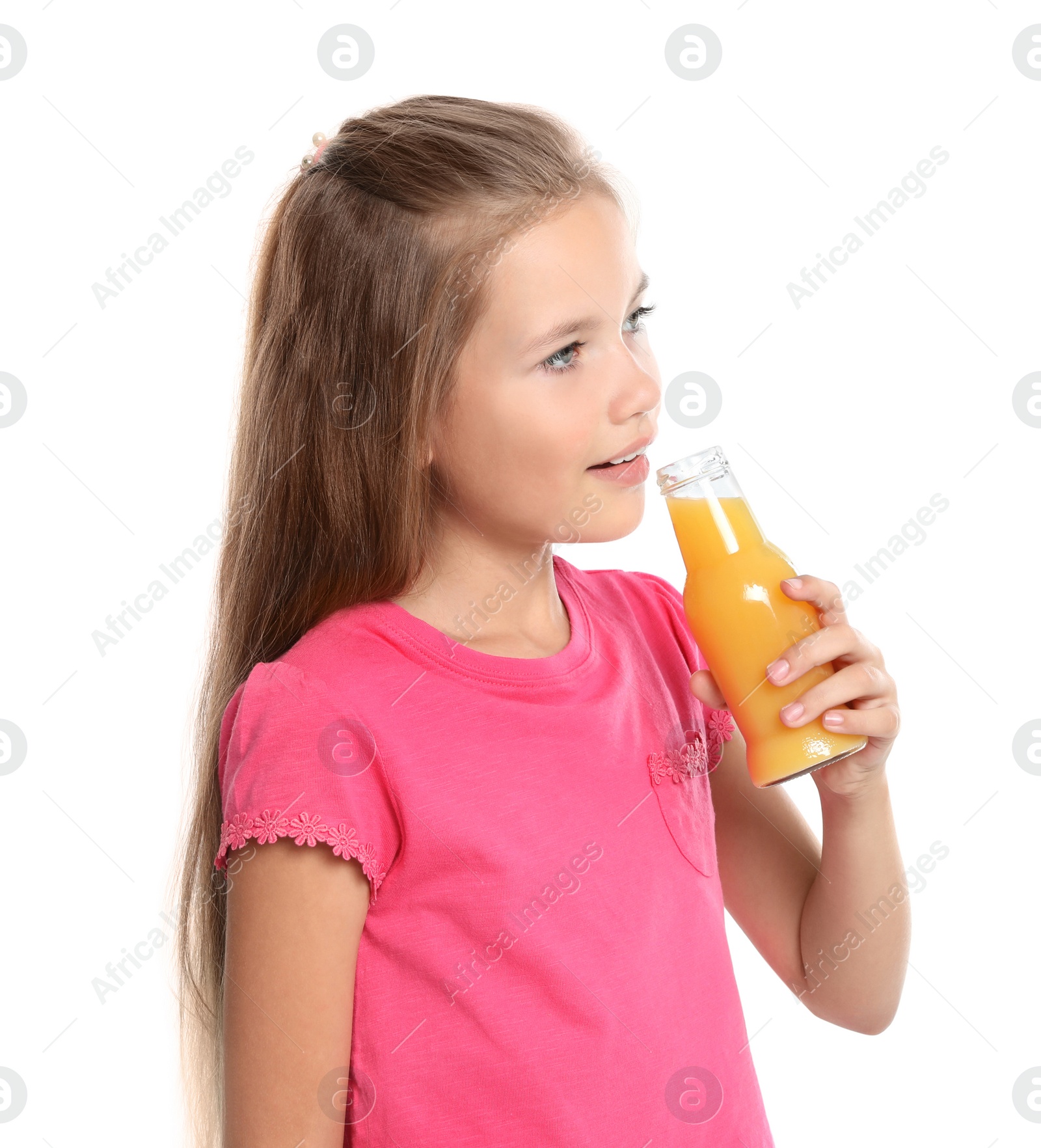 Photo of Happy girl holding bottle of juice on white background