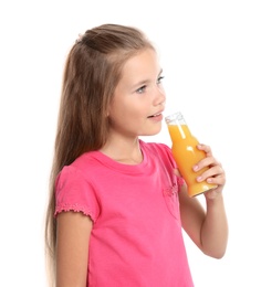 Happy girl holding bottle of juice on white background