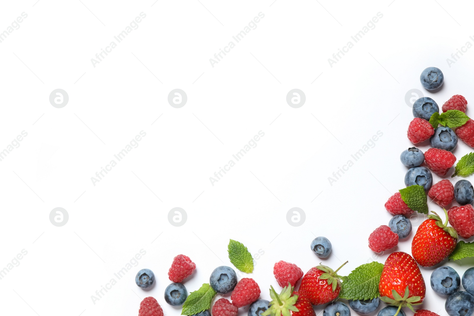 Photo of Mix of fresh berries on white background, flat lay