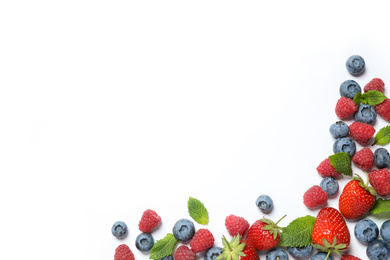 Photo of Mix of fresh berries on white background, flat lay