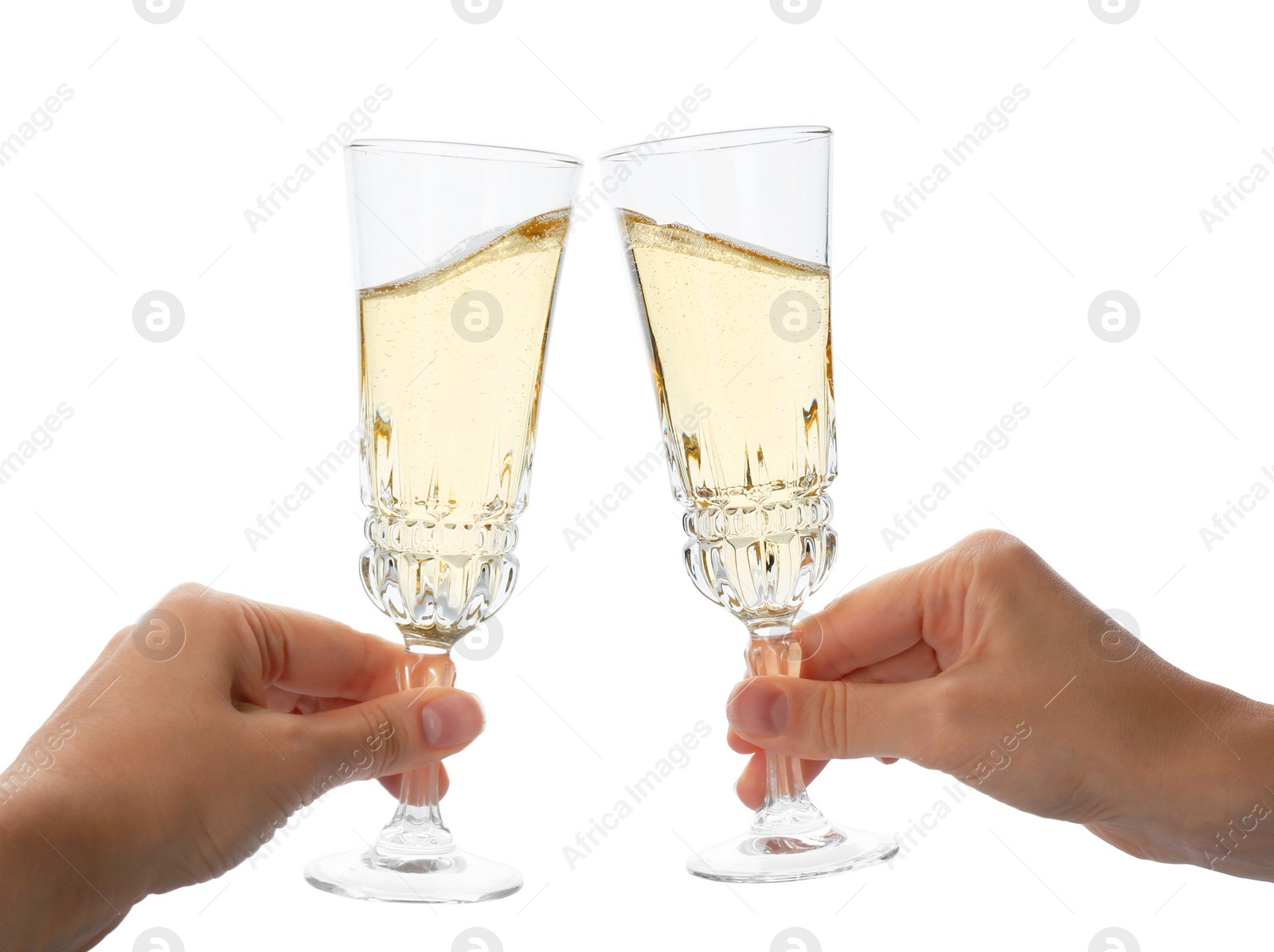 Photo of Women toasting with glasses of champagne on white background