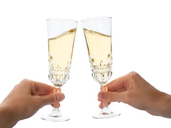 Photo of Women toasting with glasses of champagne on white background