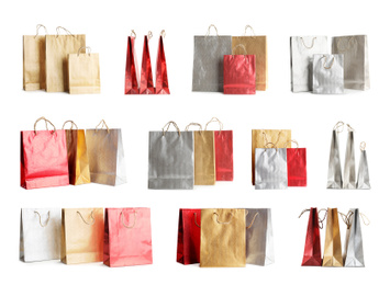 Image of Set of paper shopping bags on white background