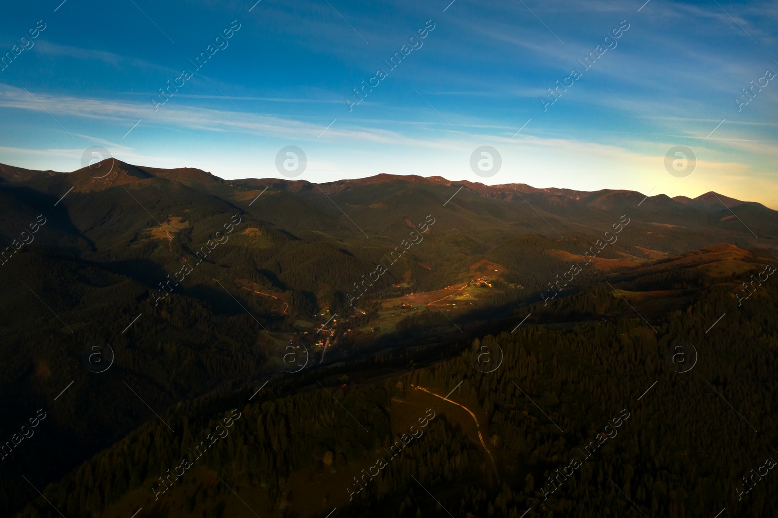 Image of Picturesque view of mountain landscape with forest on sunny day. Drone photography