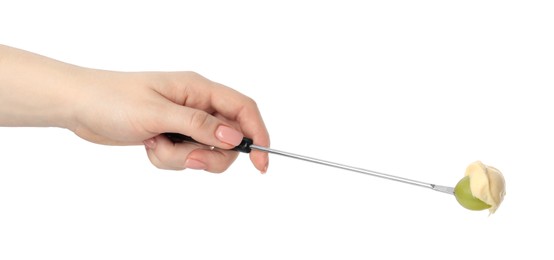 Photo of Tasty fondue. Woman holding fork with grape and melted cheese on white background, closeup