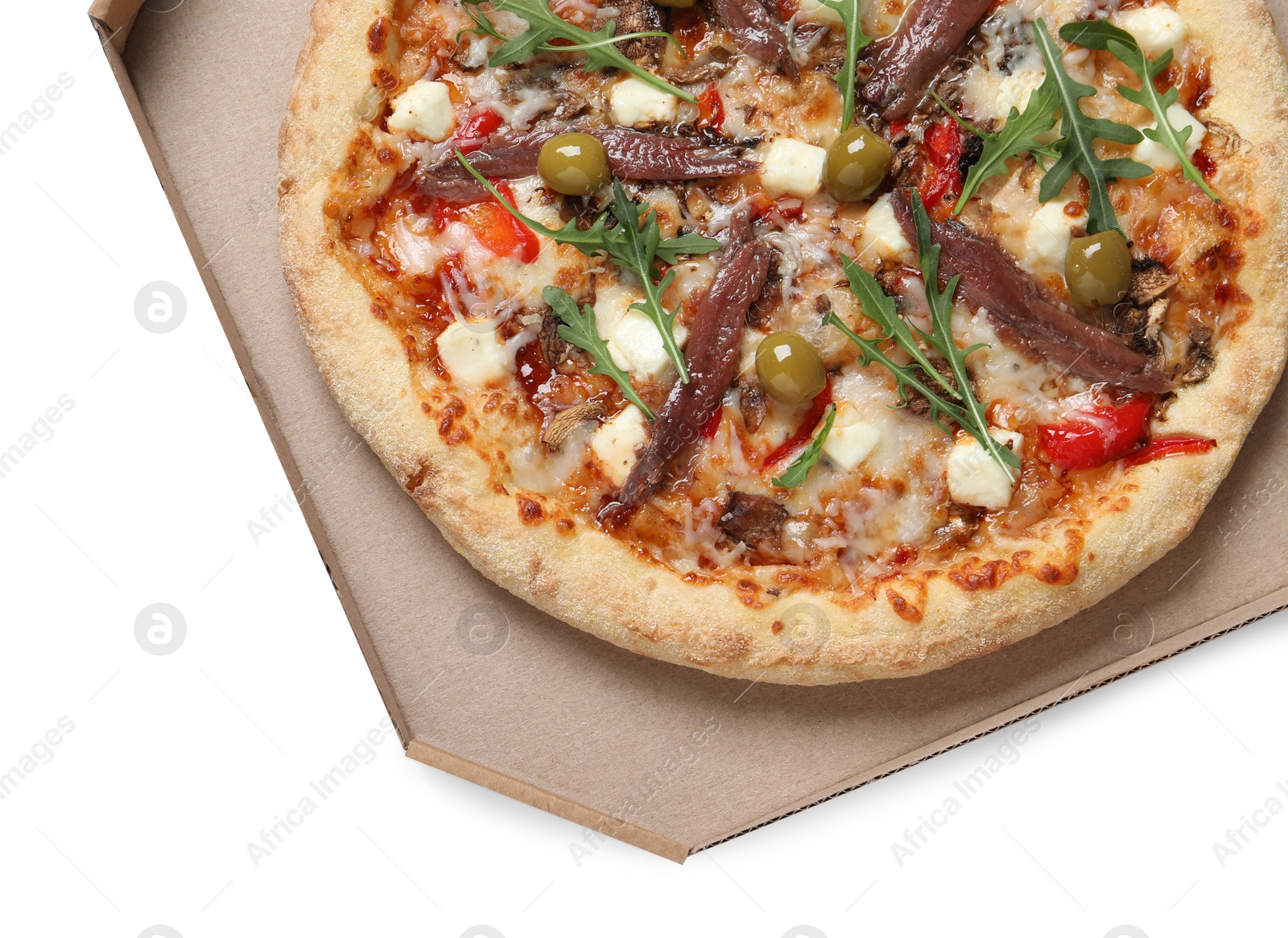 Photo of Tasty pizza with anchovies, arugula and olives in cardboard box isolated on white, top view