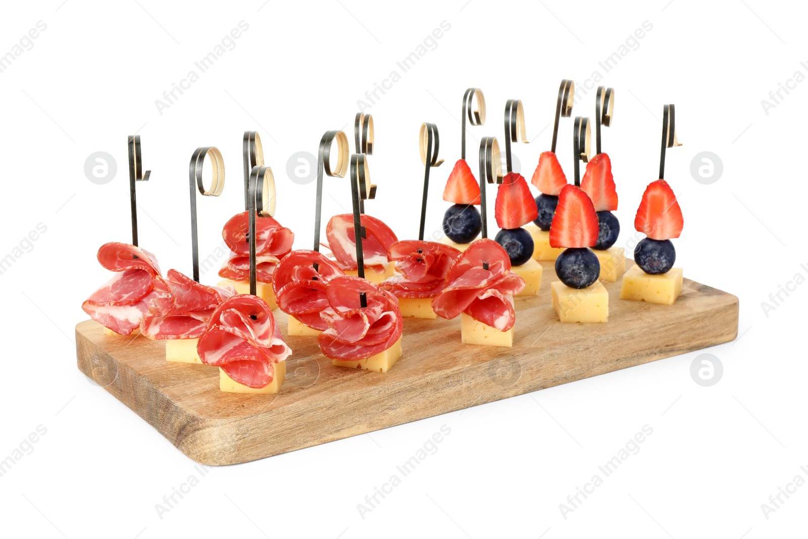 Photo of Plate with different tasty canapes isolated on white