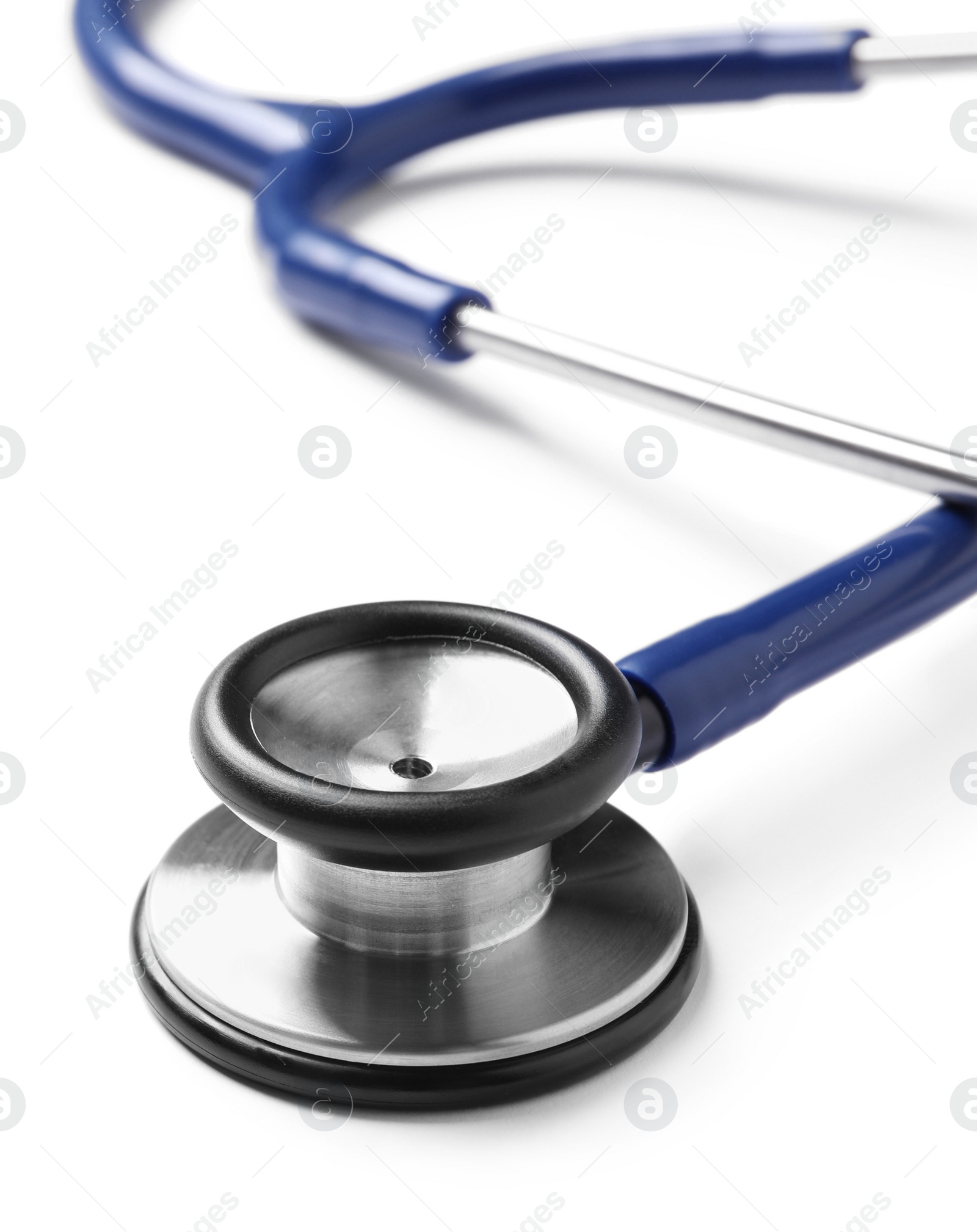 Photo of Modern stethoscope on white background, closeup view