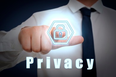 Image of Businessman activating privacy feature on virtual screen against dark blue background, closeup