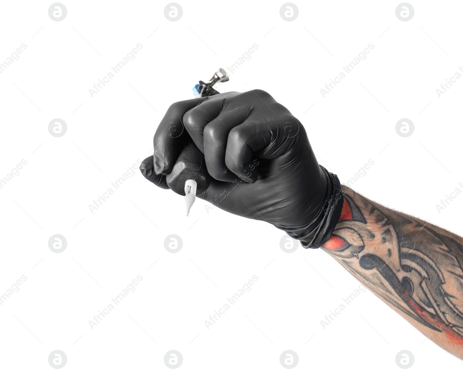 Photo of Professional tattoo artist with machine on white background, closeup