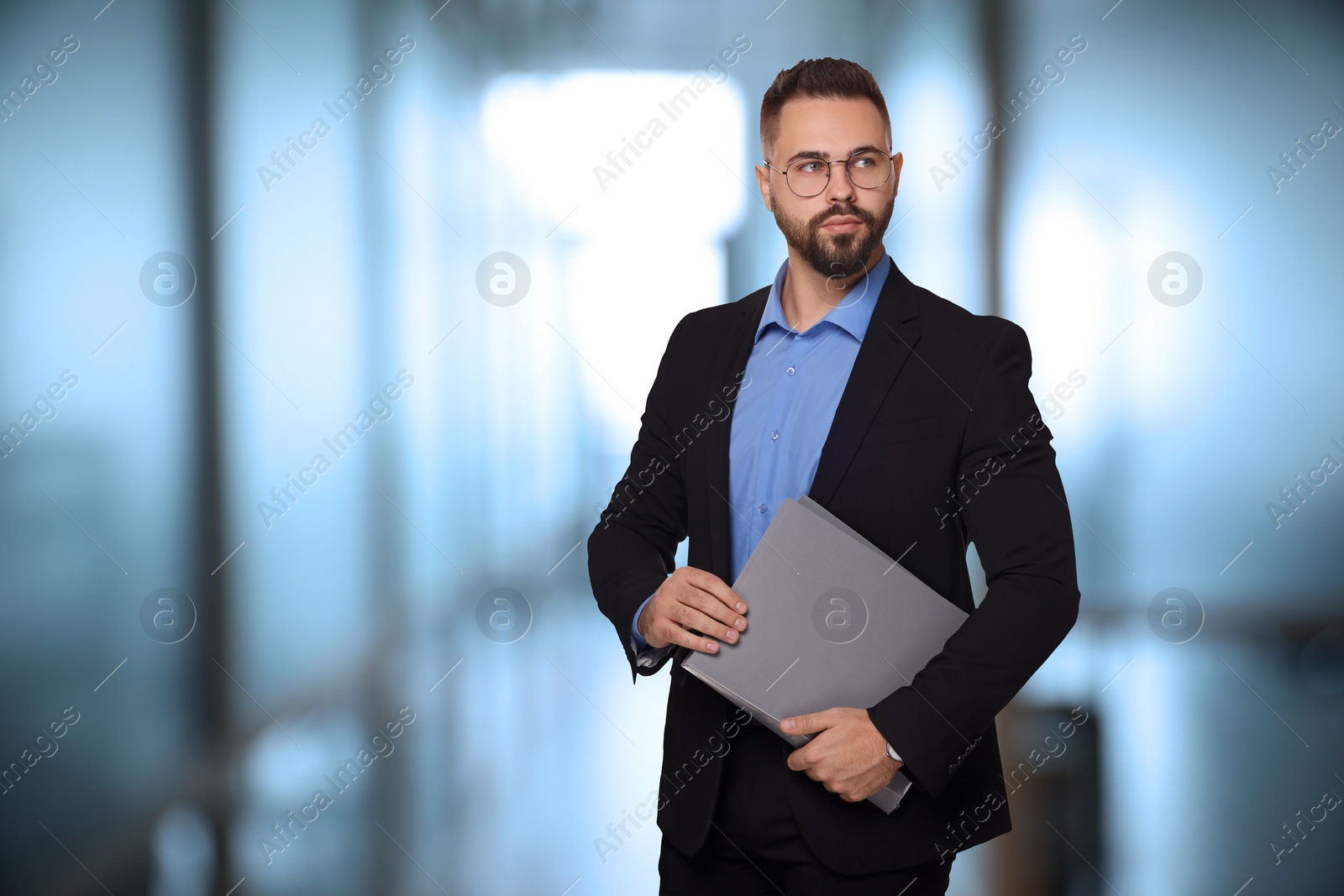 Image of Successful lawyer with laptop on blurred background, space for text