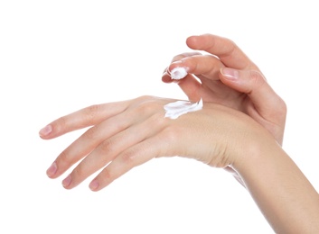 Photo of Young woman applying body cream on white background