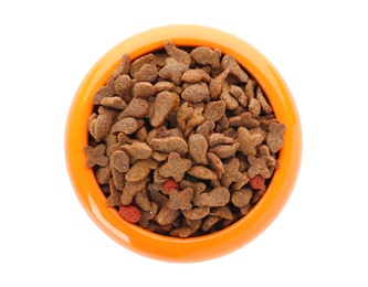 Bowl of dry pet food on white background, top view