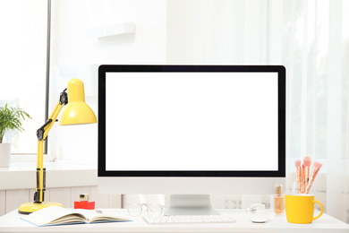 Photo of Comfortable workplace with modern computer on table