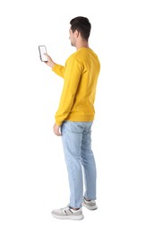Photo of Man using smartphone with blank screen on white background