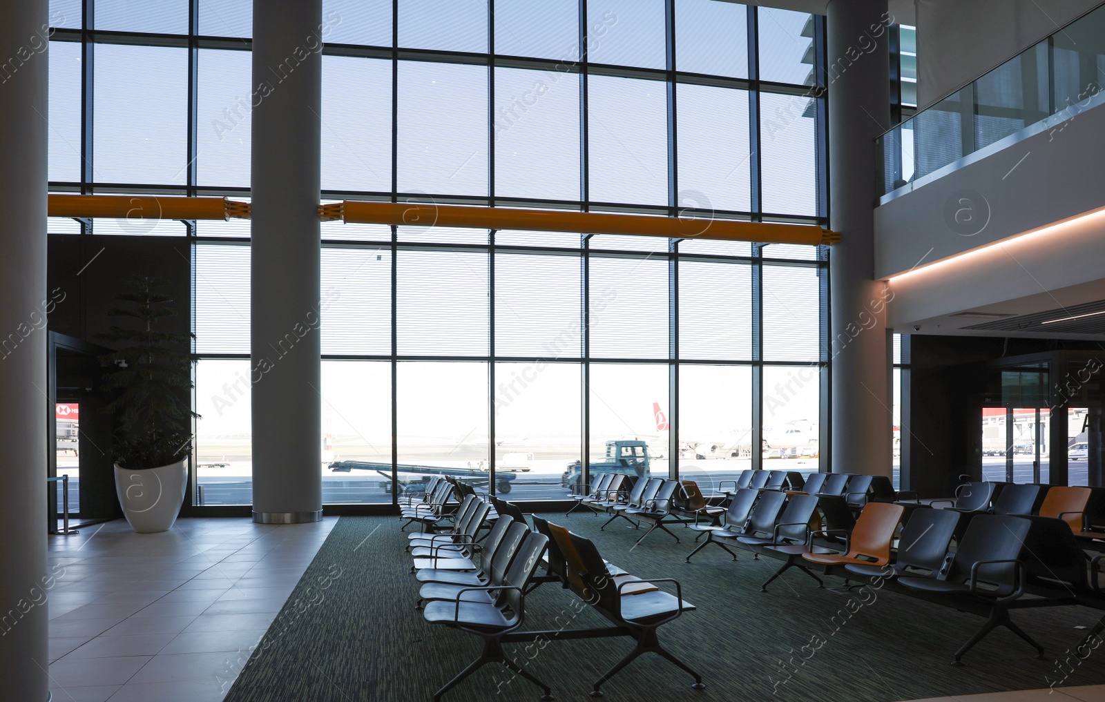 Photo of ISTANBUL, TURKEY - AUGUST 13, 2019: Waiting area with seats in new airport terminal