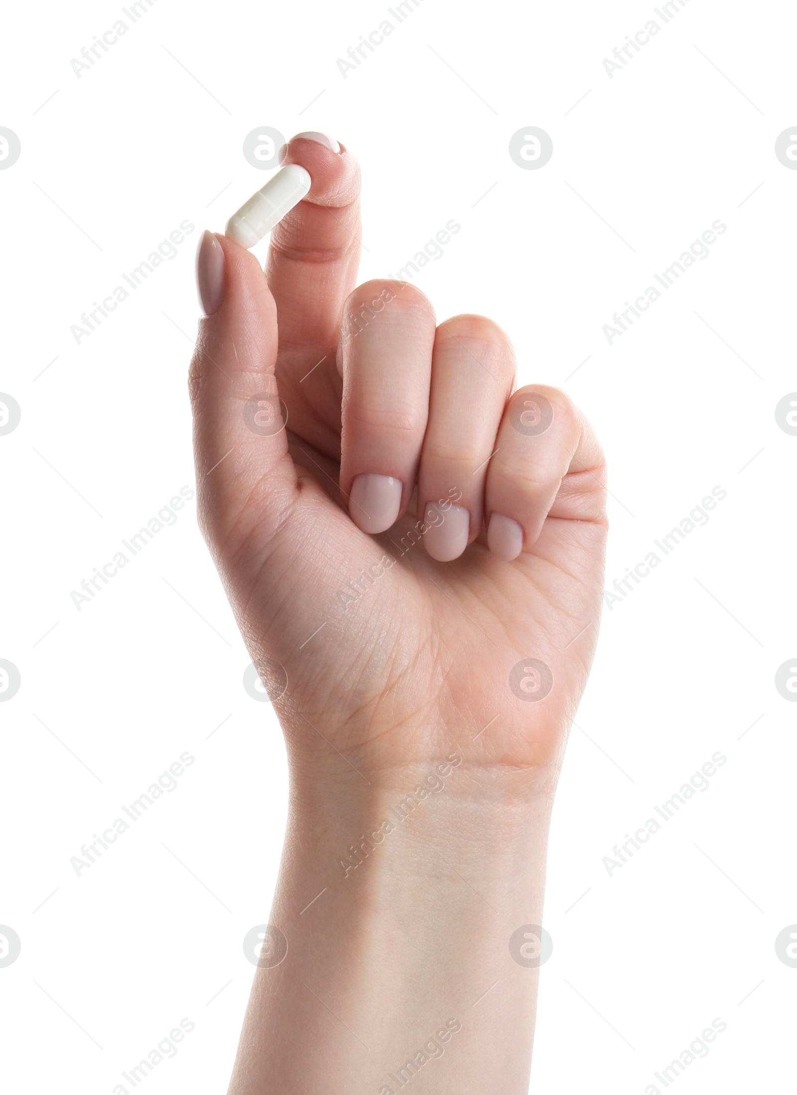 Photo of Woman holding vitamin capsule on white background, closeup. Health supplement