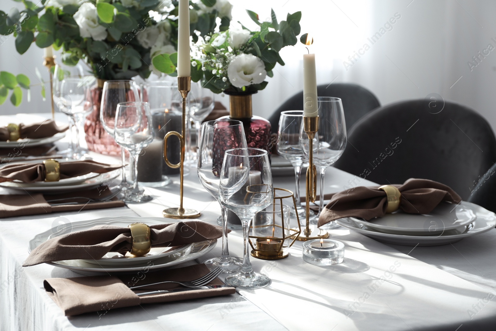 Photo of Festive table setting with beautiful decor indoors