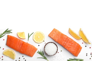 Photo of Composition with fresh raw salmon fillets on white background, top view