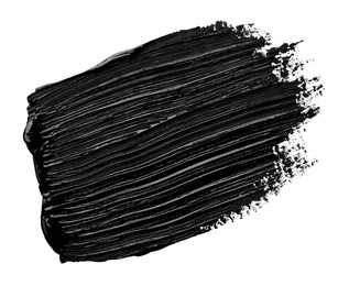 Brushstrokes of black oil paint on white background, top view