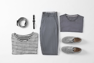 Photo of Flat lay set of stylish male clothes and accessories on white background