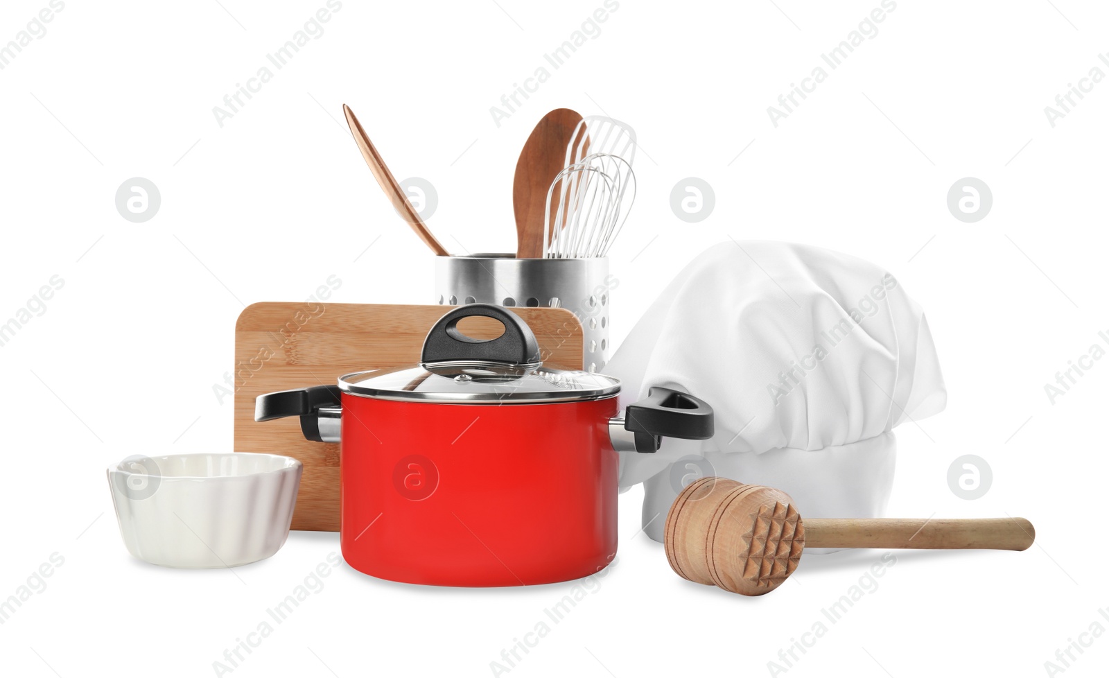 Photo of Set of different cooking utensils and chef's hat on white background