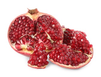 Photo of Fresh cut pomegranate with juicy seeds isolated on white