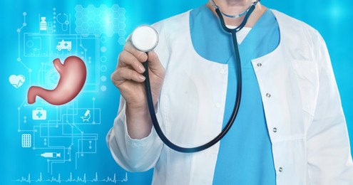 Image of Illustration of stomach and mature doctor with stethoscope on light blue background, closeup. Banner design