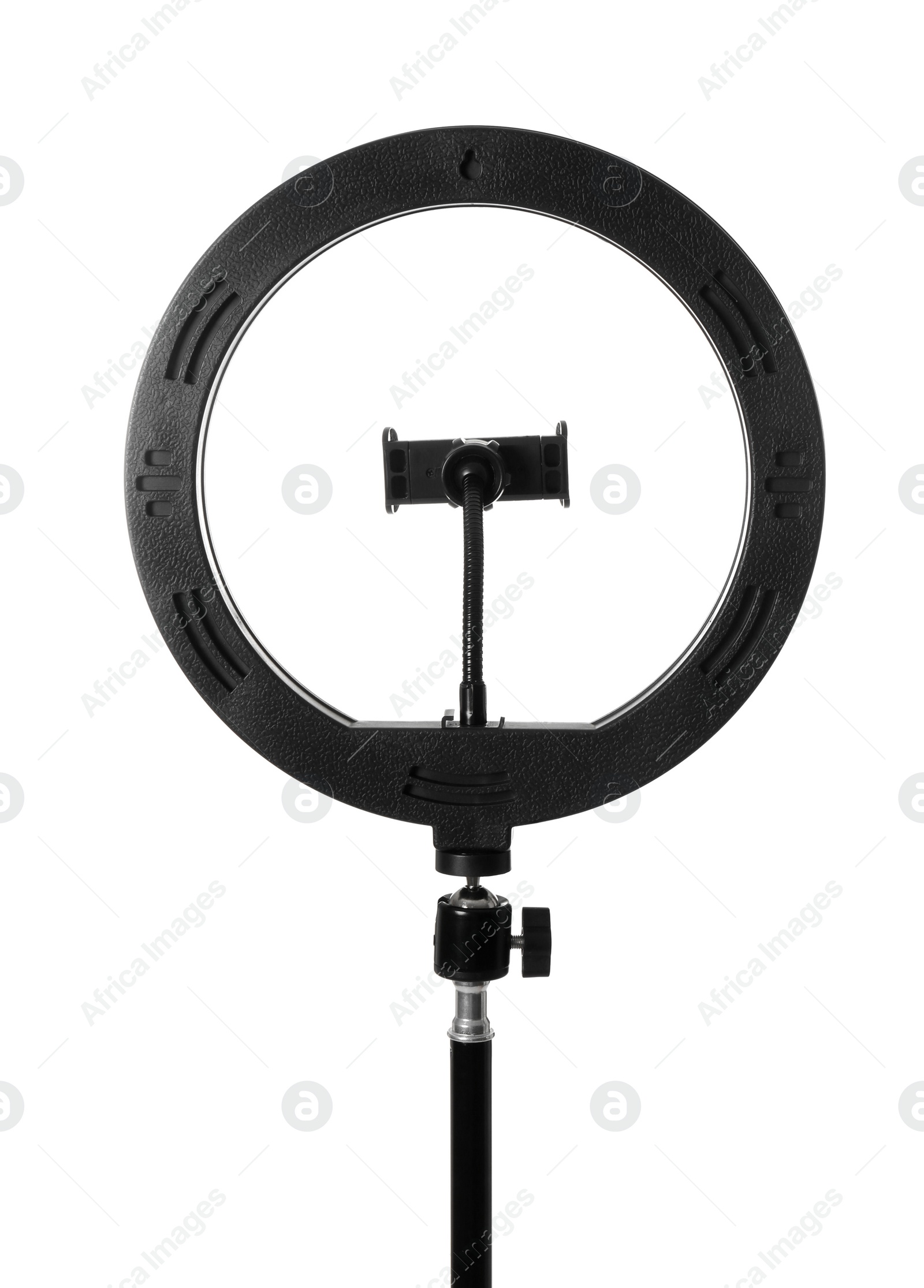 Photo of Modern ring light on stand against white background