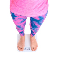 Photo of Young woman measuring her weight using scales on white background. Weight loss motivation